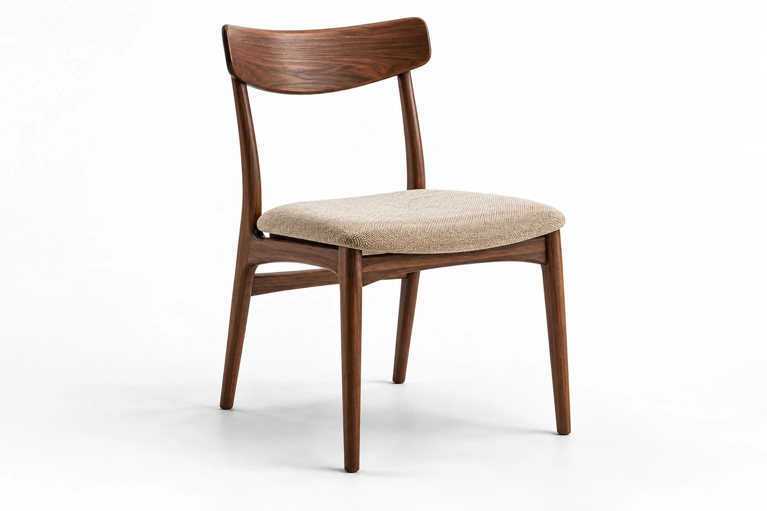 Walnut dining chair with sand-coloured upholstery against a white background